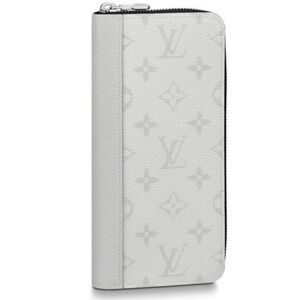 Previously loved Louis Vuitton Arctic White Monogram Leather Wallet. Stamped SK.